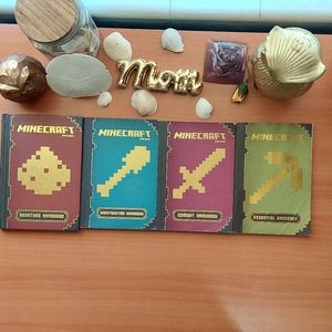 Set of 4 Minecraft guide books. One hard cover and the rest are paperback.📚⚔
